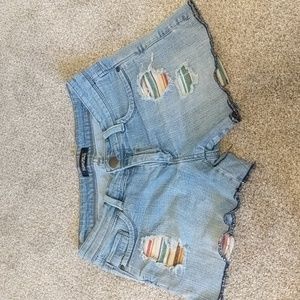 Shorty shorts, rainbow peek- a-boo pockets